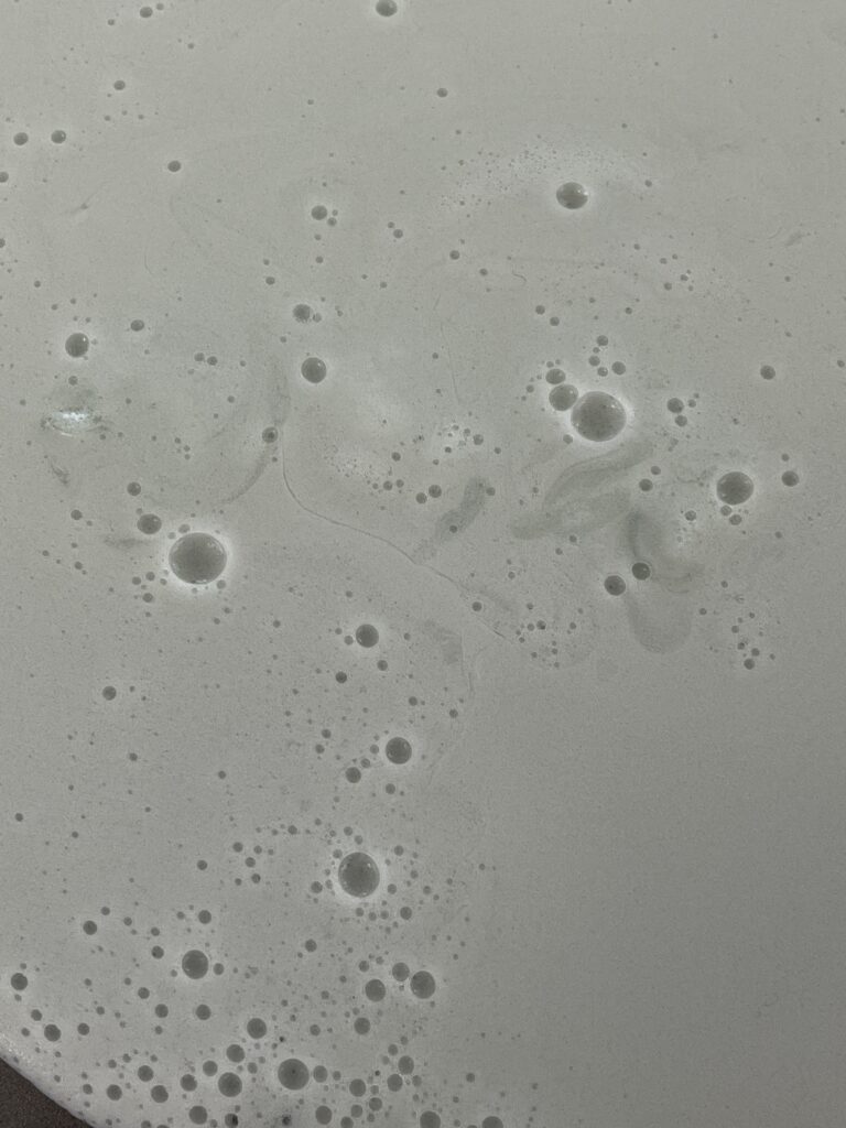 White biofoam mixture with some air bubbles.