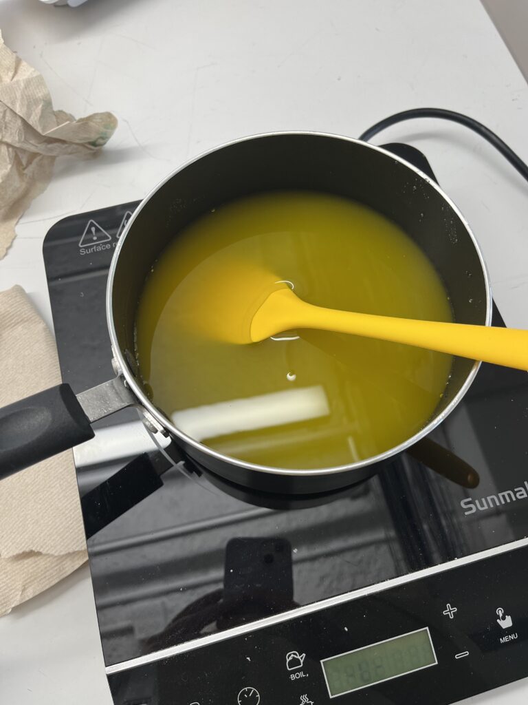 Agar agar bioplastic solution with yellow food coloring.