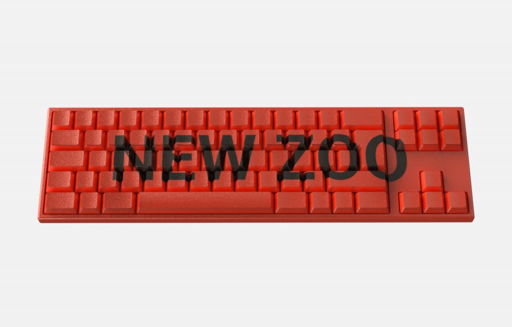 a computer keyboard with "NEW ZOO" written on top