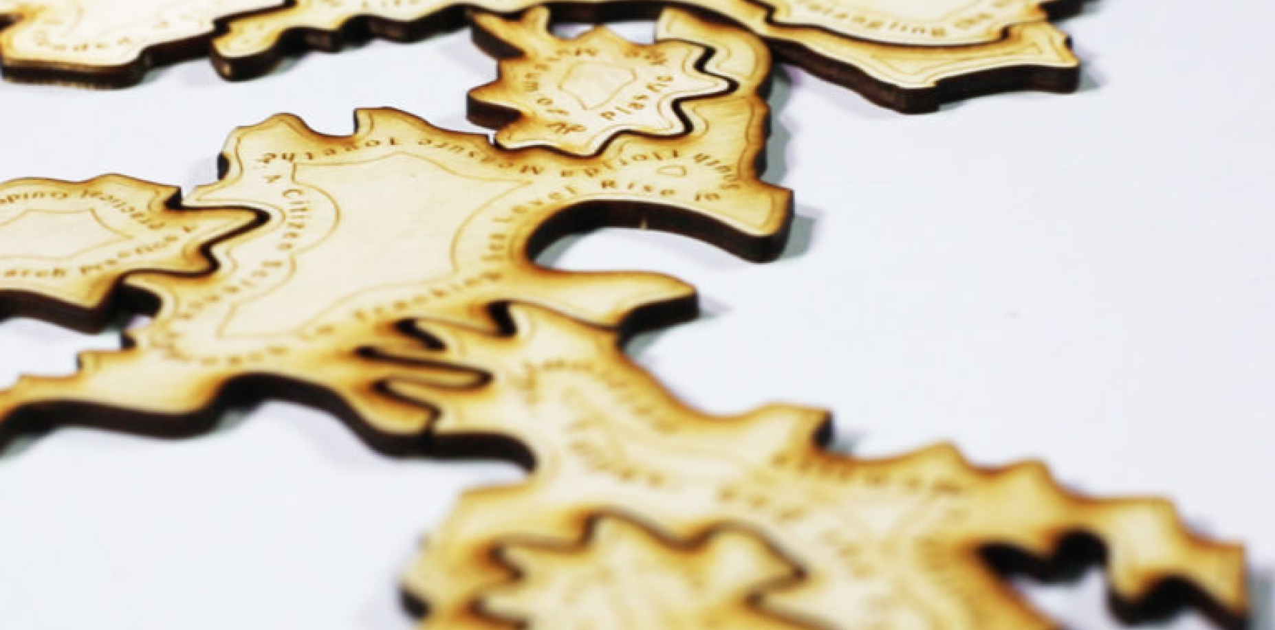 A close up of laser cut puzzle pieces.