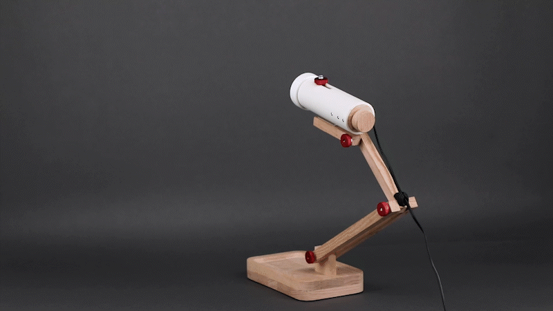 A demonstration of "Adjustable Spotlight", a custom lamp by Shannon Hu & Daniel Rautenbach.