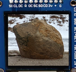 mini LCD screen with image of a boulder