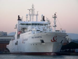 Submarine cable laying ship used to deploy cables connecting vast distances.