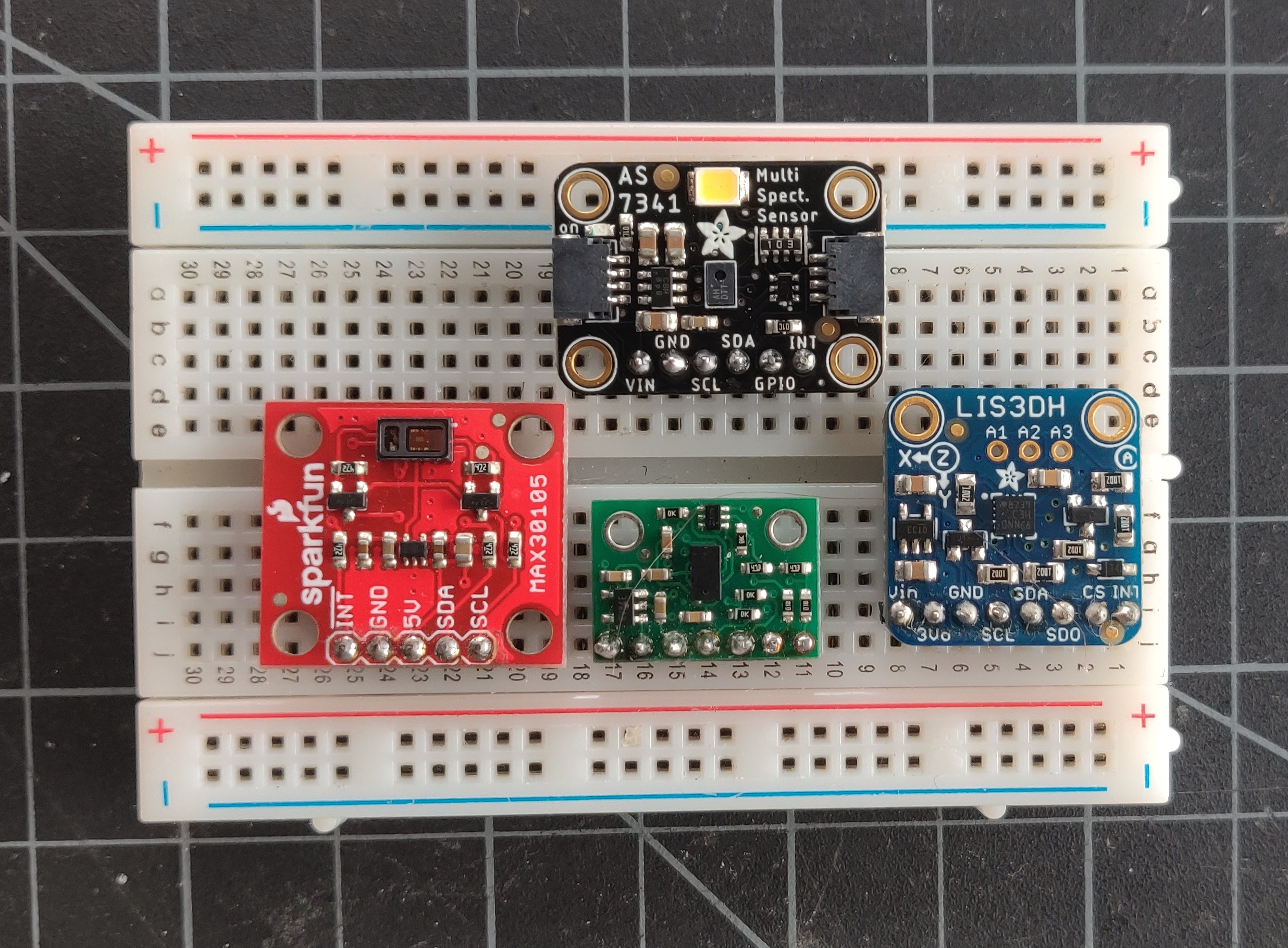 Photo of four different I2C sensor modules