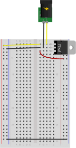 At the top of the drawing, there is a DC power jack. Yellow and black wires from the jack connect to a 7805 5-volt voltage regulator mounted in the top right three rows of the breadboard with its tab facing to the right. The power supply's yellow wire is connected to the regulator's top pin row, the input pin. The power supply's black wire is connected to the regulator's middle pin, or ground. A yellow wire connects the regulator's top pin, the input pin, to the outer left side row of the board. This is an unregulated voltage bus on the left side. It will be used to control the motor. A red wire connects the regulator's output pin, the bottom pin, to the inner right side bus. This will be the regulated voltage bus. Another black wire connects the regulator's middle pin, ground, to the inner right side row of the board. This is the ground bus on the left side. Similarly, a black wire connects the left side ground bus to the outer row on the right side. This is the right side ground bus. There is no connection between the unregulated voltage bus on the left and the regulated voltage bus on the right, however. 