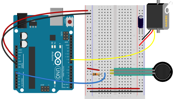 Breadboard view of a servomotor and an analog input attached to an Arduino Uno. The +5 volts and ground pins of the Arduino are connected by red and black wires, respectively, to the left side rows of the breadboard. +5 volts is connected to the left outer side row (the voltage bus) and ground is connected to the left inner side row (the ground bus). The side rows on the left are connected to the side rows on the right using red and black wires, respectively, creating a voltage bus and a ground bus on both sides of the board. A force-sensing resistor, or FSR, is mounted in rows 18 and 19 of the left center section of the breadboard. a 10-kilohm resistor connects one leg of the FSR to the left side ground bus. A blue wire connects the row that connects these two to analog in 0 on the Arduino. A red wire connects the other pin to the left side voltage bus. A servomotor's voltage and ground connections are connected to the voltage and ground buses on the left side of the breadboard. the servomotor's control wire is connected to pin D9 of the Arduino. A 10-microfarad capacitor is mounted across the +5V and ground buses close to where the motor voltage and ground wires are connected.