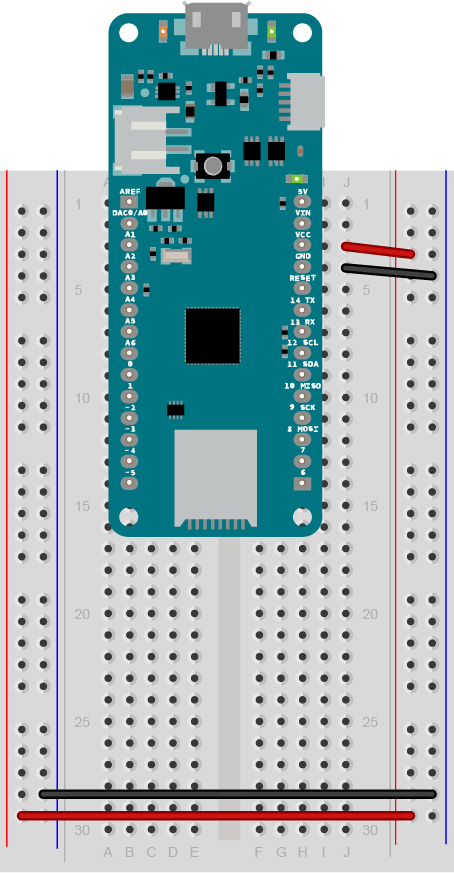 An Arduino MKR series microcontroller mounted on a breadboard