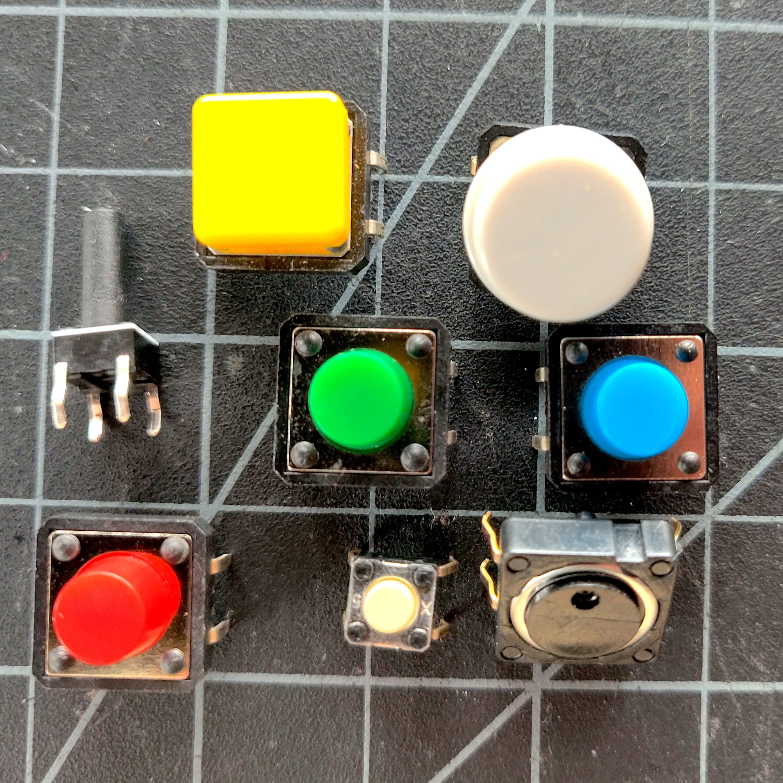 Photo of a variety of different tactile switches. 