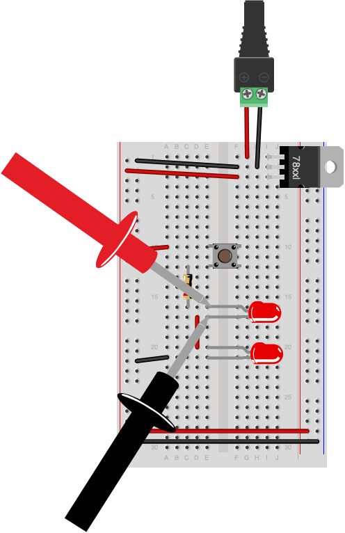 Breadboard drawing of a solderless breadboard as shown in the drawing above, with a 5-volt voltage regulator, a pushbutton, a 220-ohm resistor and 2 LEDs. The red probe of a multimeter is touching anode of the first LED. The black probe of the meter is touching cathode of the first LED. 