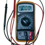 Multimeter tool. This tool has a dial to set the function, and three holes into which to plug the testing leads. The leads are currently plugged into the center hole and the right hand hole.