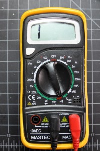 Photo of a meter set to check continuity. The dial indicator is pointed to a symbol that has a dot next to three concentric arcs radiating out from the dot. This is a symbol for a speaker. The continuity check will beep. 