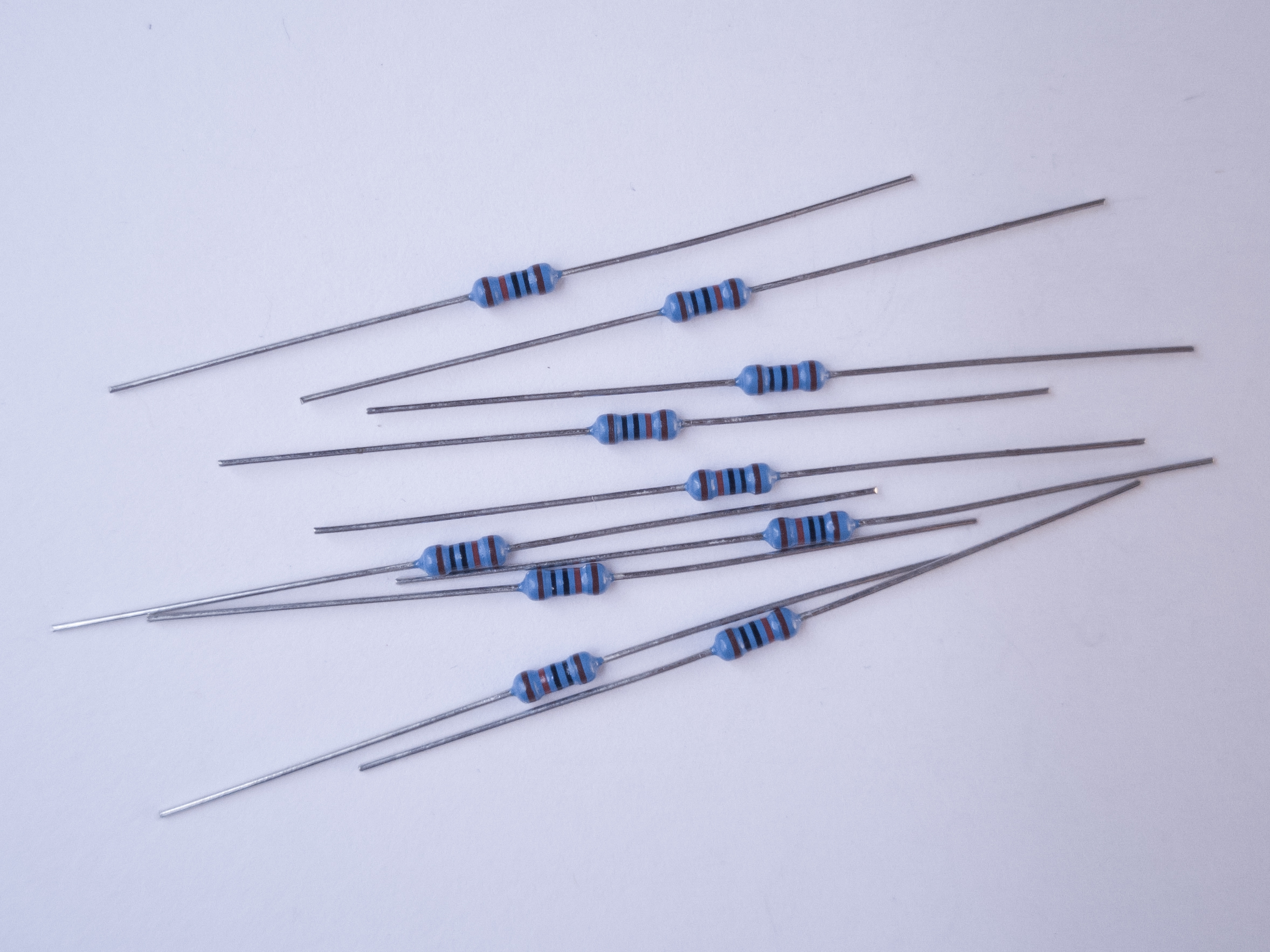 Photo of a handful of 10-kilohm resistors