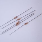 Photo of a handful of 1-kilohm resistors.