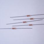 Photo of a handful of 220-ohm resistors.