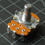 Photo of a potentiometer with metal ring contacts.