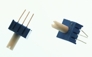 Trimmer potentiometers. These are small potentiometers, square, approximately half an inch (1cm) square. They have three legs spaced 0.1 inches (2.54cm) apart and can be therefore mounted on a solderless breadboard.