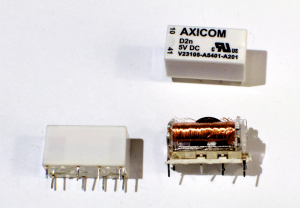 These components are rectangular, approximately three quarters of an inch long and half an inch tall, with seven pins on the bottom. 