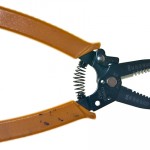 Wire strippers. The jaws of this wire stripper have multiple hole sizes so that it can strip wires of variable sizes.