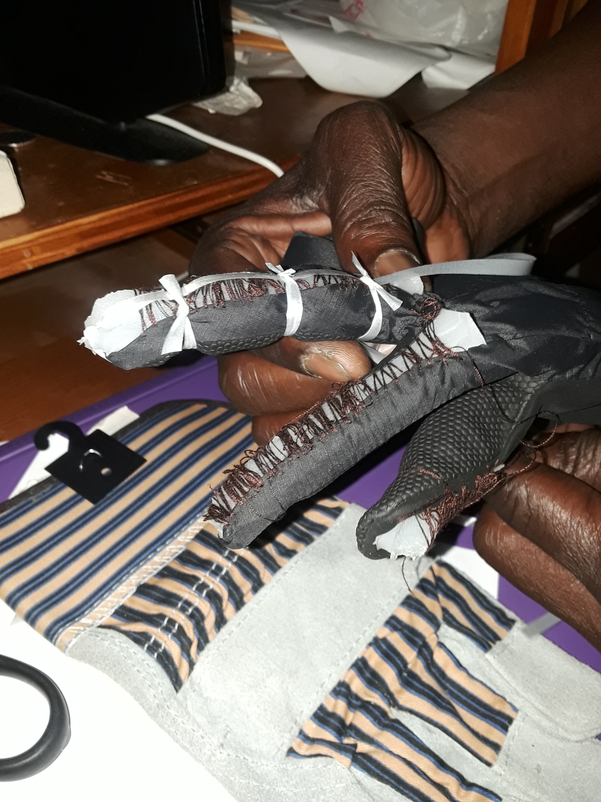A soft robotic glove prosthetic to help those with neuromuscular disorders.