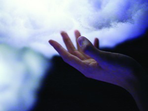 hand touching cloud