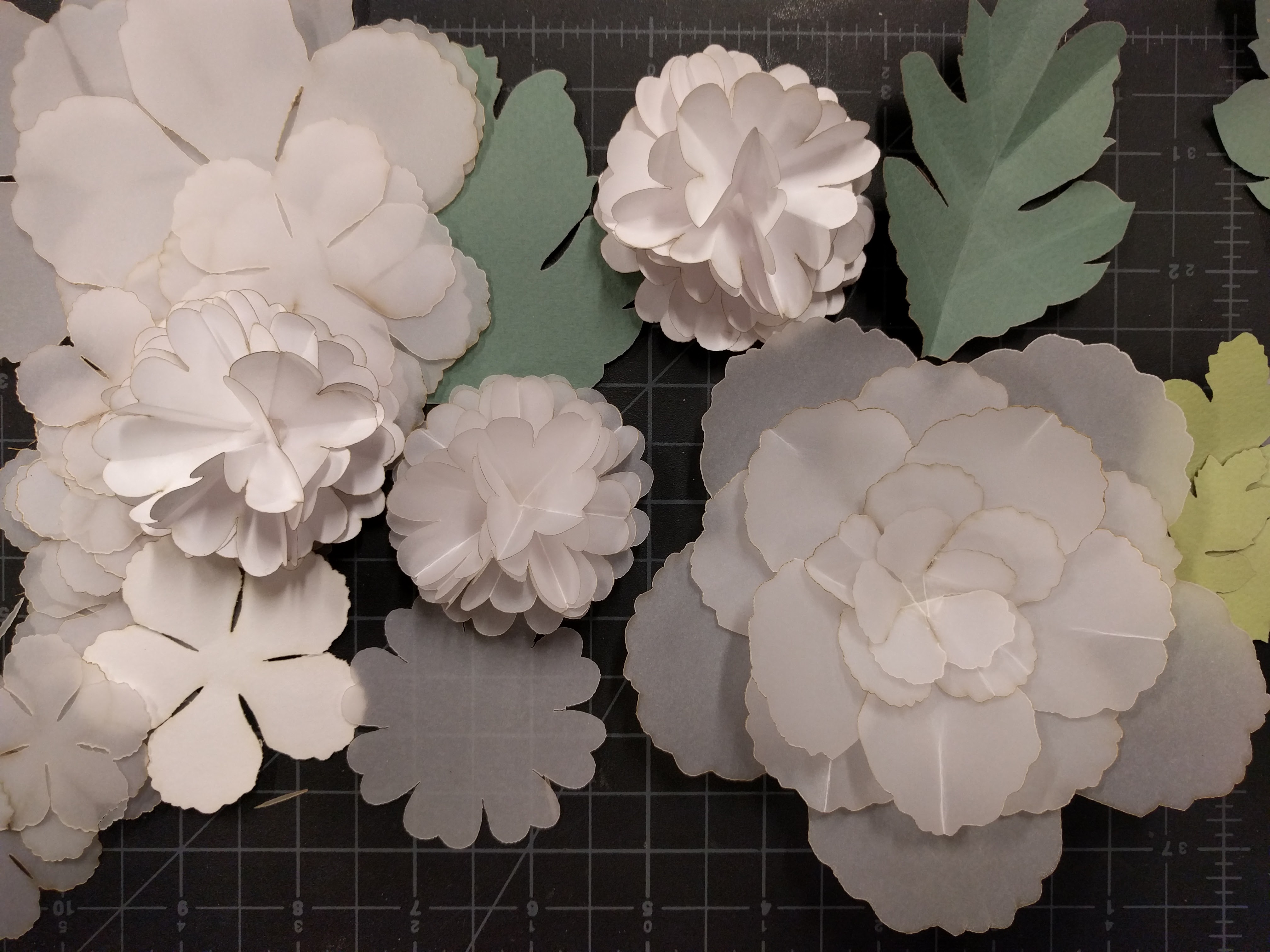 An interactive lighting paper flower wallpaper/