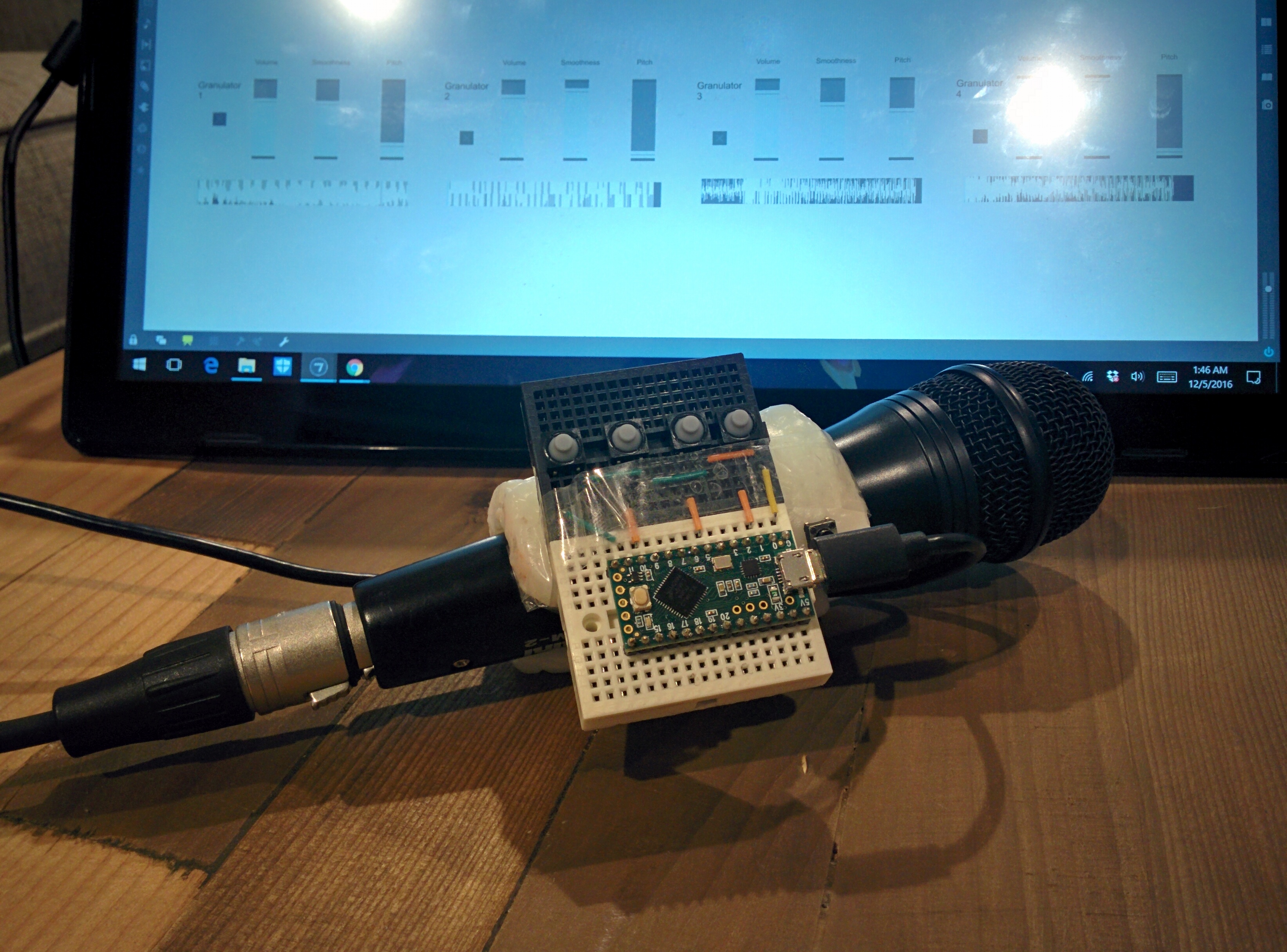 A controller that wraps around a microphone and turns recorded sounds into synthesizer voices.