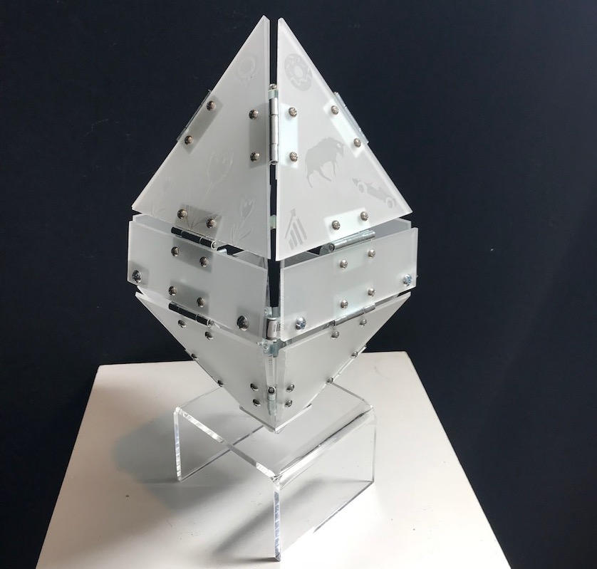 Cryptomania is a sculpture designed as commentary on the pandemonium surrounding cryptocurrencies such as Bitcoin or Ethereum. It pulsates with light based on real-time price changes of a particular cryptocurrency.