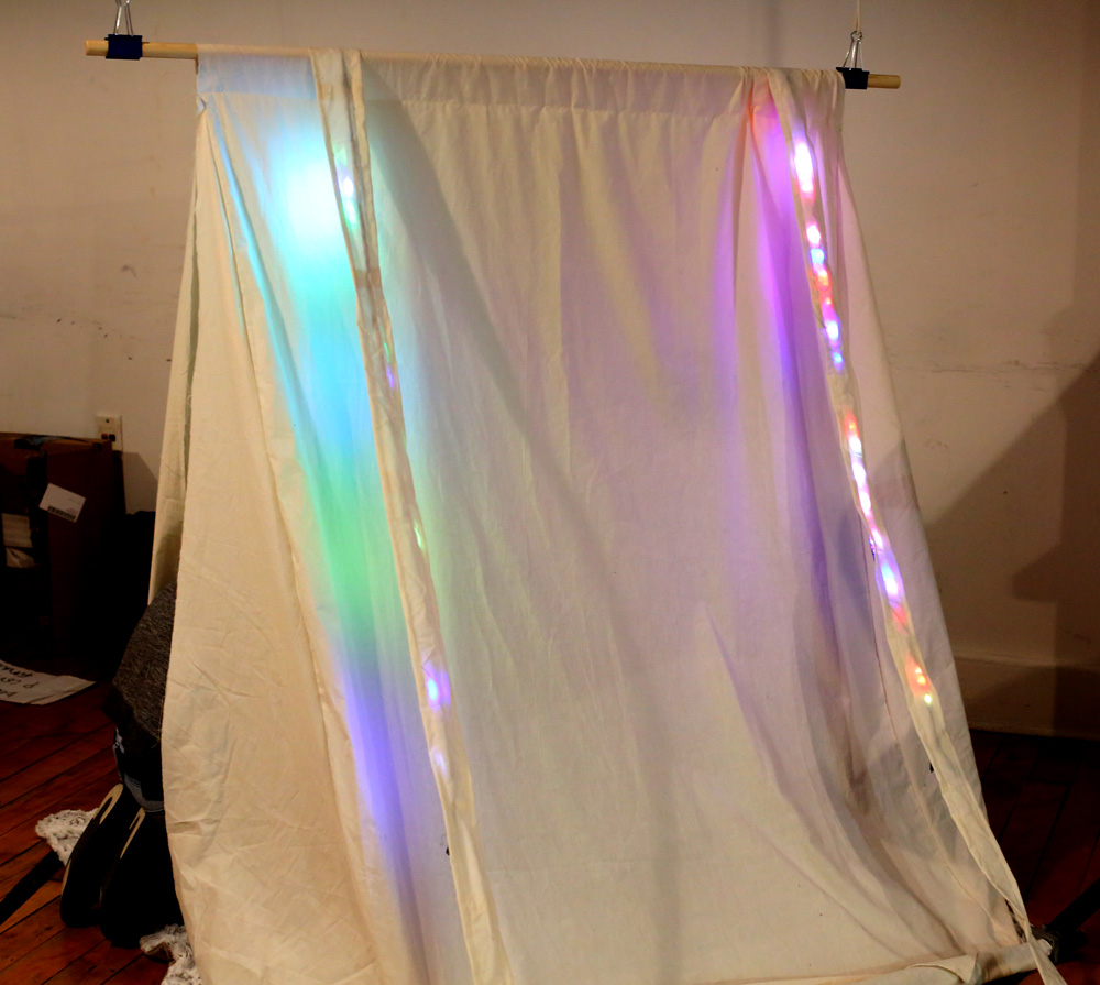 A playful, sensory space for two people to connect through interactions with sound and light.