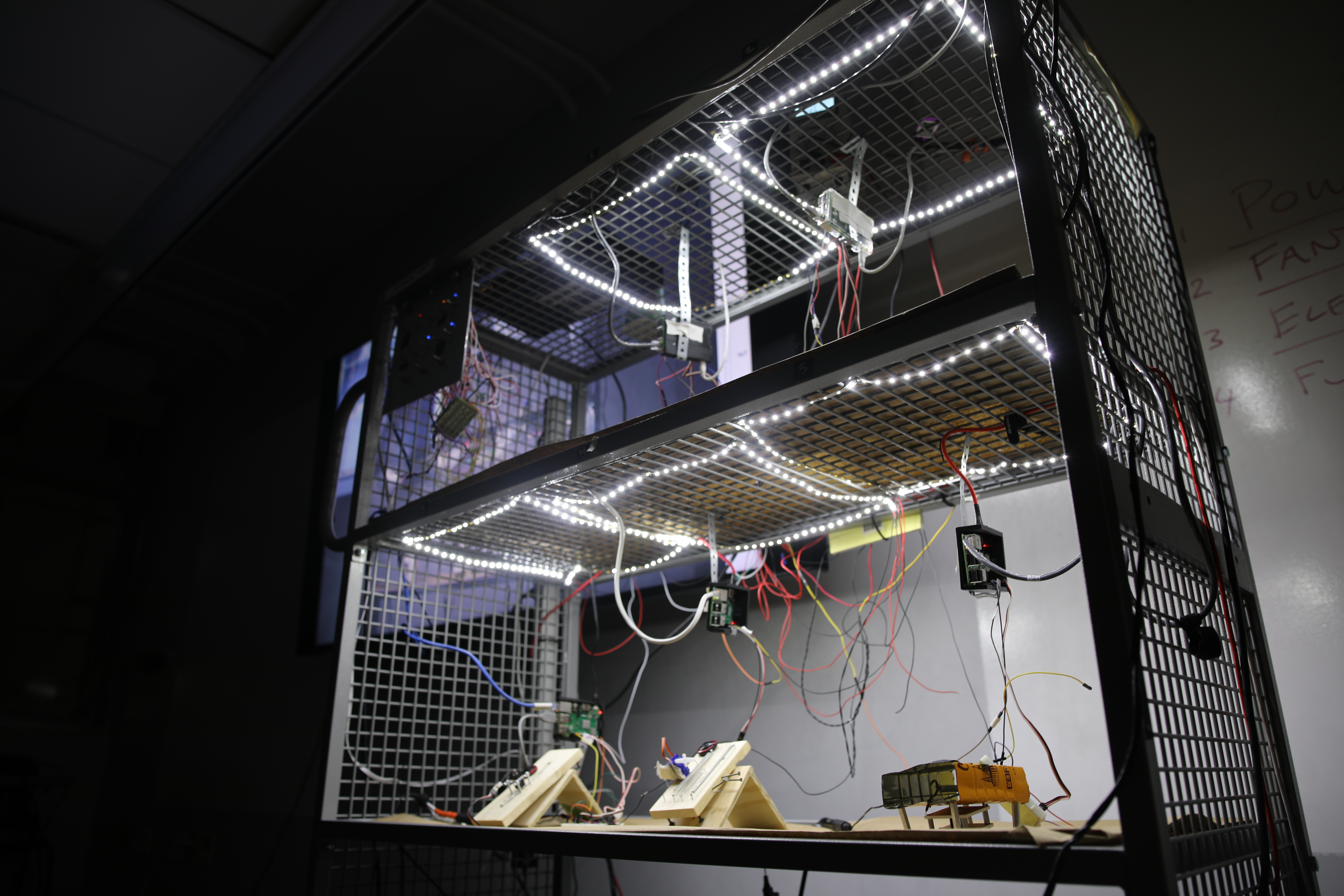 This instrument interprets the physical and digital labor of computer networking technology. It is made with 9 computers with custom server code, DIY electronics, and recycled objects.
