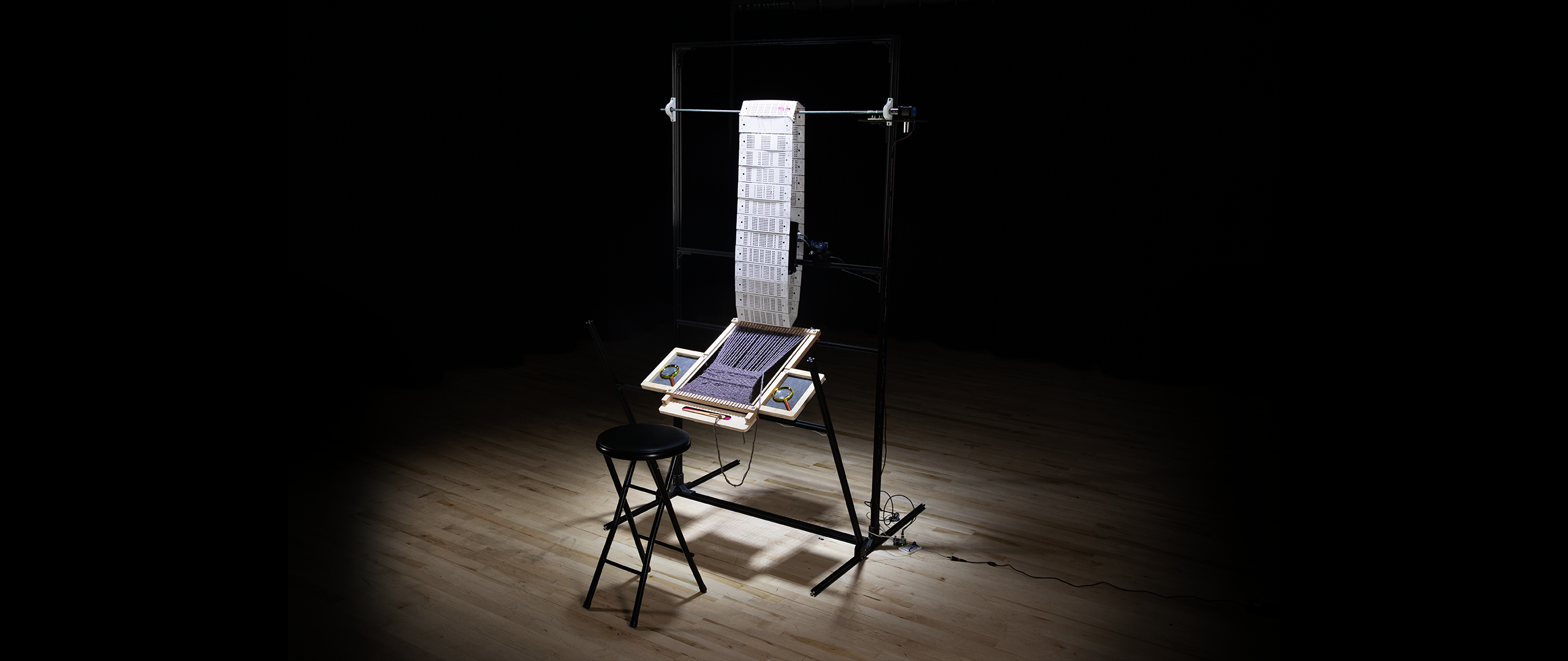 Installation with a stool for a participant to sit on