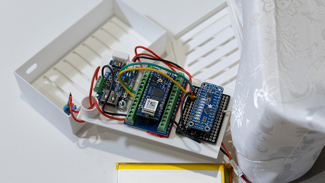 A close up of the electronics contained in the "pillow" used for the sculpture