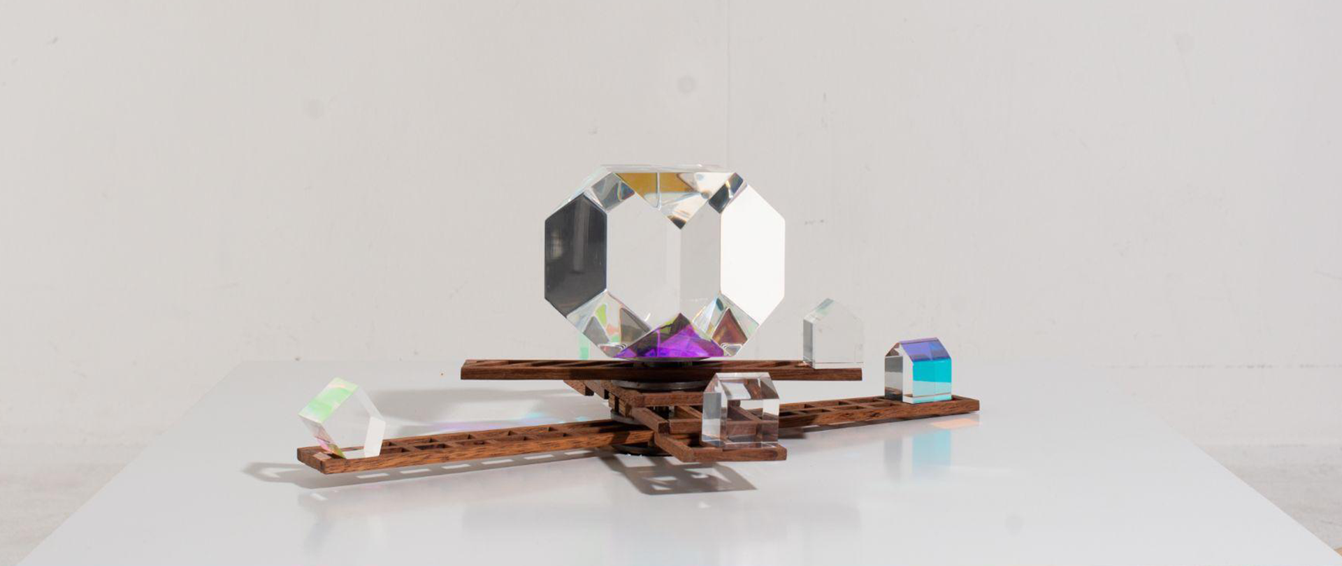 Side view of Framework: Of Time. Dichroic prisms placed on top of wooden frames.
